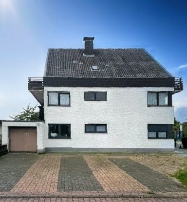Dreifamilienhaus mit Sanierungsbedarf